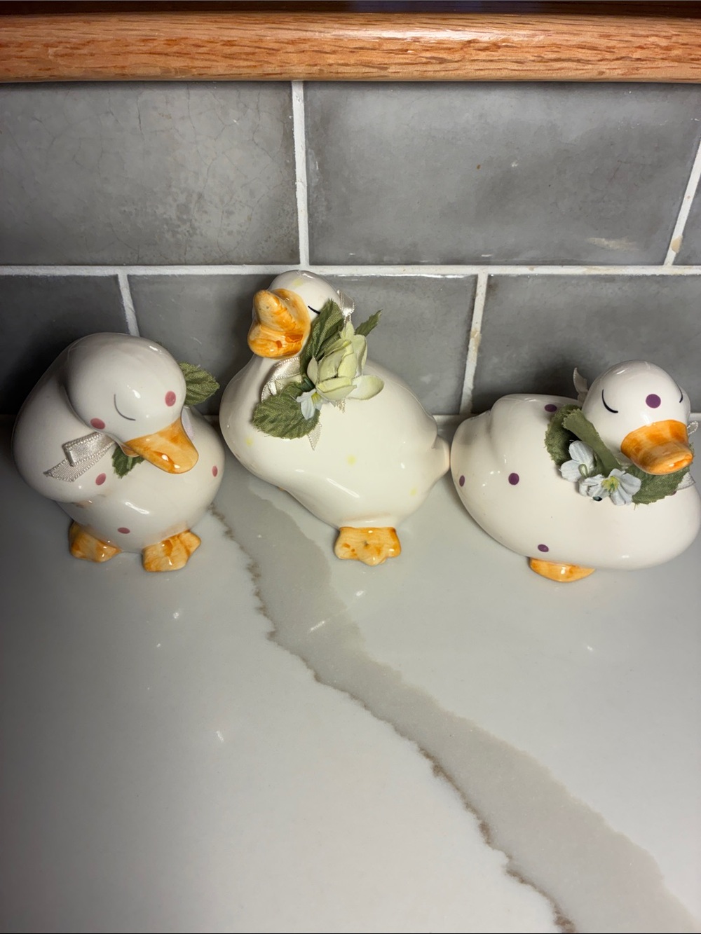 Enesco white and yellow Ceramic Duck Figurines with Floral Accents. Vintage